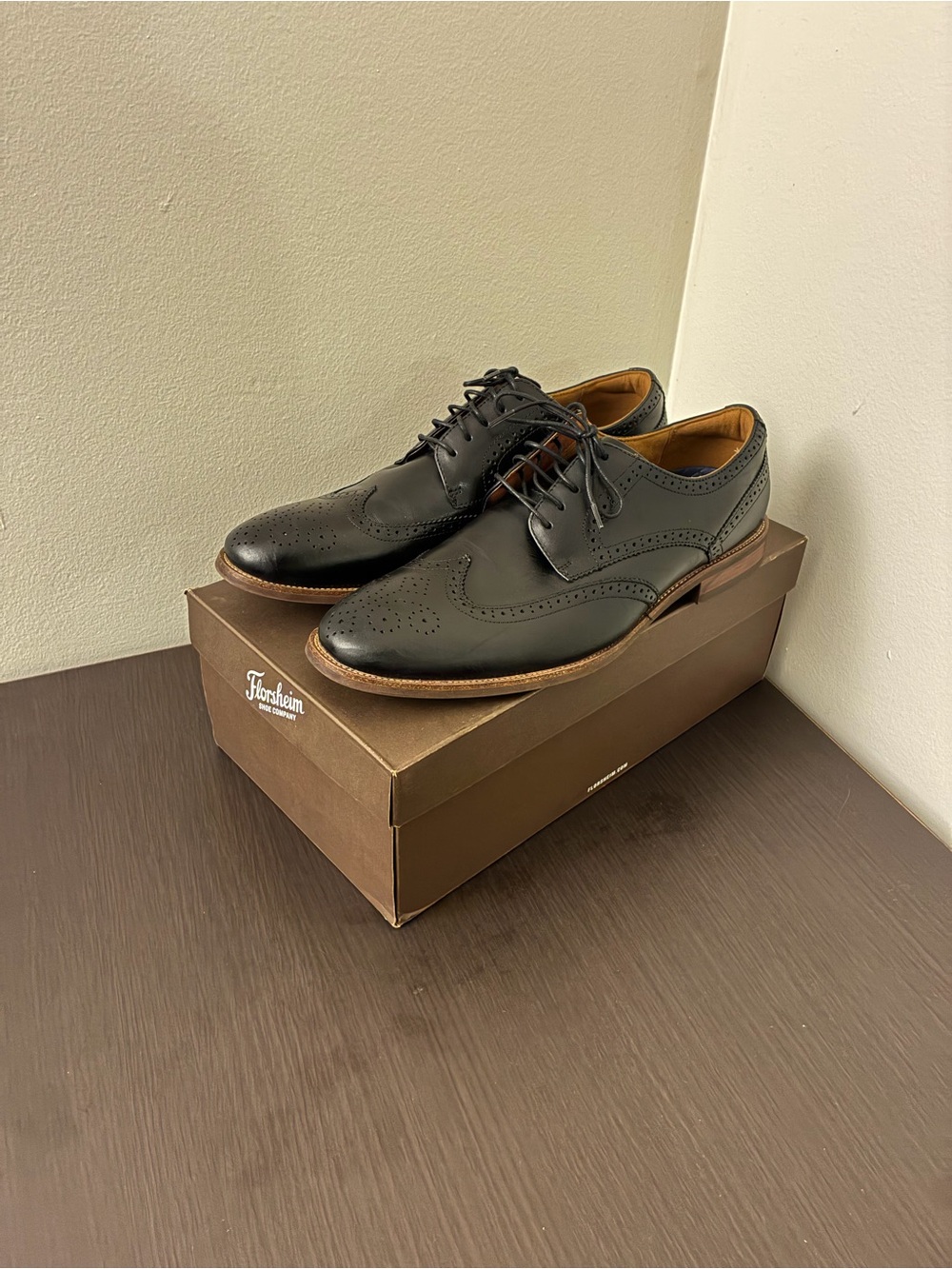 Florsheim Black Leather Wingtip Oxfords with Brown Sole Trim